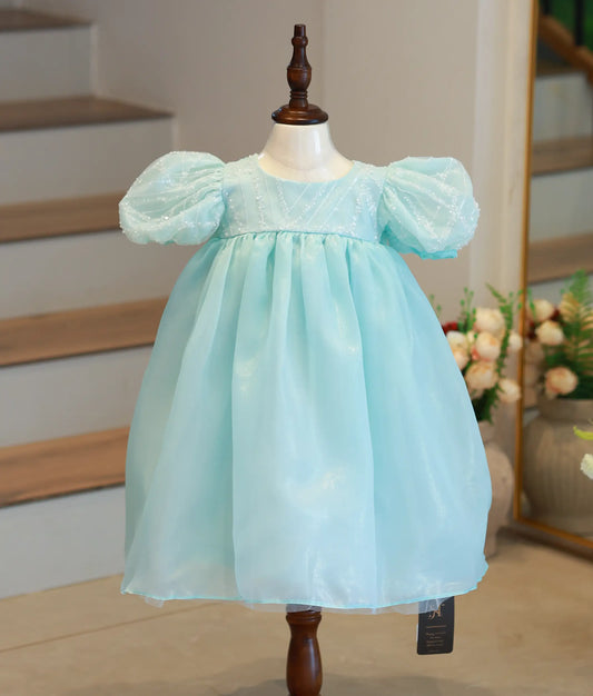 Front view of a powder blue shimmer organza Frozen theme dress for baby girls with sequin detailing