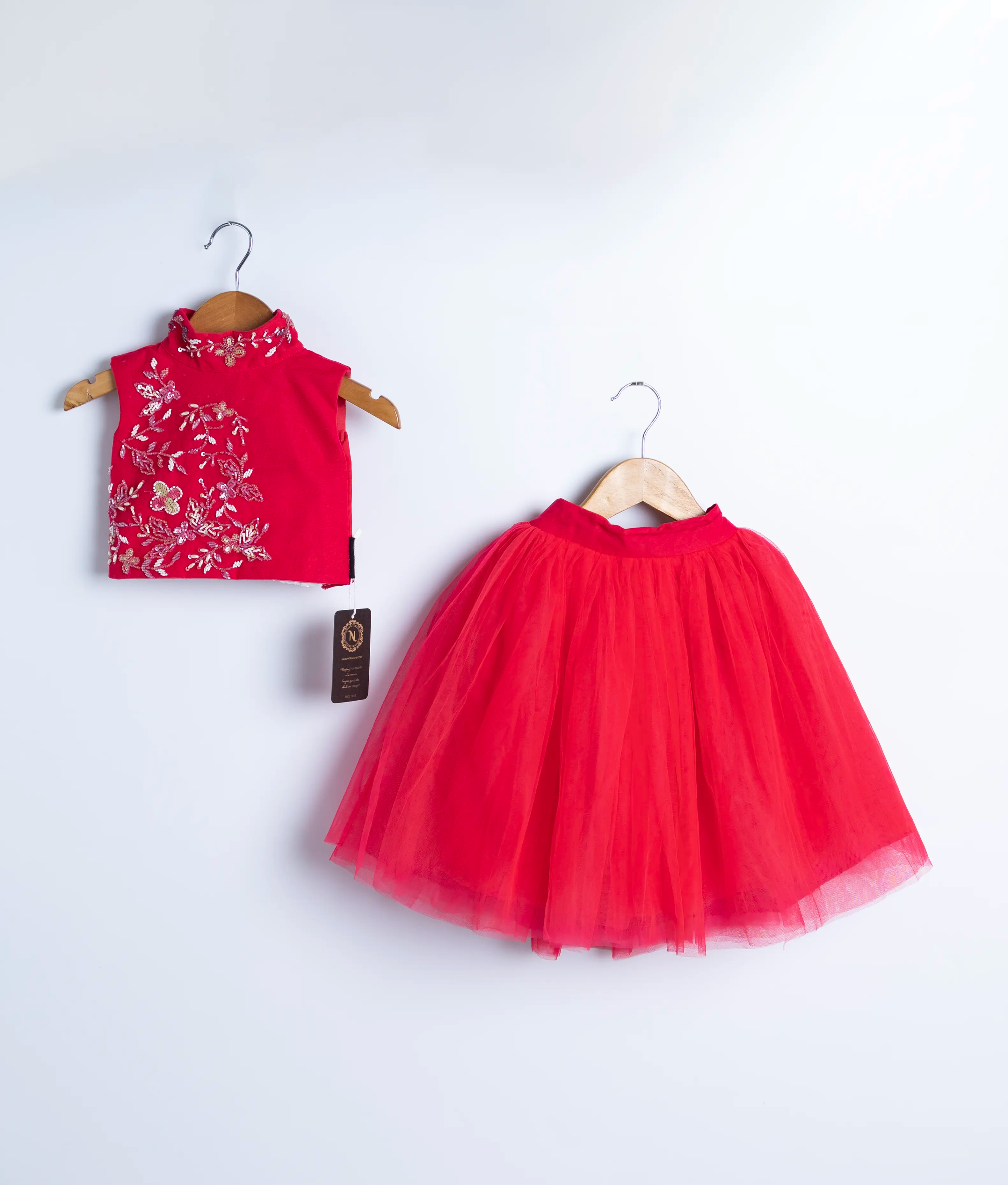 Red baby girl dress set with embroidered floral top and layered net skirt – ideal for festive occasions and parties