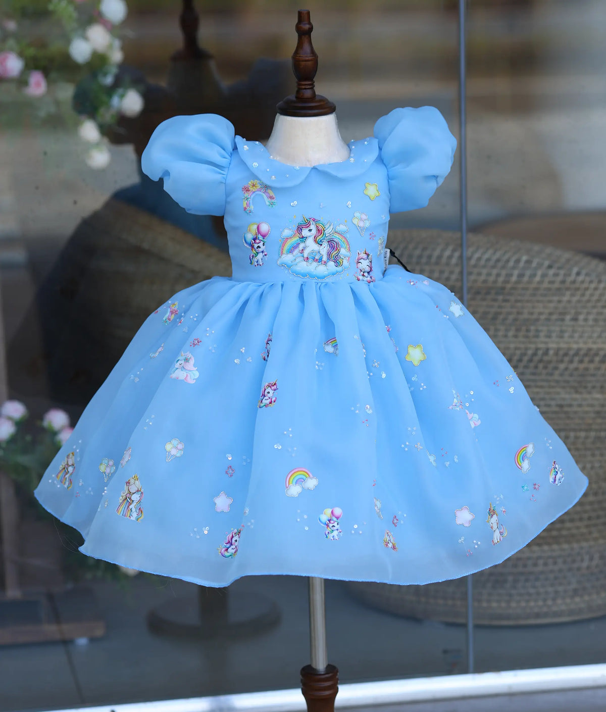 Sky blue handworked unicorn frock for baby girl with puff sleeves, perfect for birthday wear
