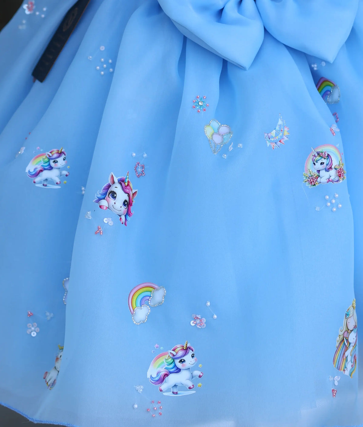 Sky blue unicorn theme frock for baby girl with handworked rainbow and sequin detailing