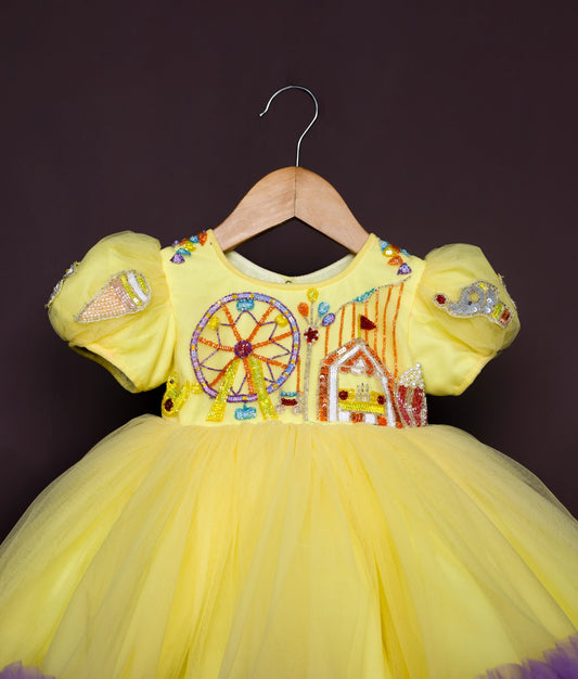 Front view of sunflower tutu dress with yellow bodice and decorative flower details for girls