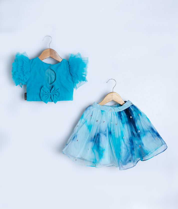 Two-piece baby dress set in turquoise with embellished top and matching tie-dye skirt
