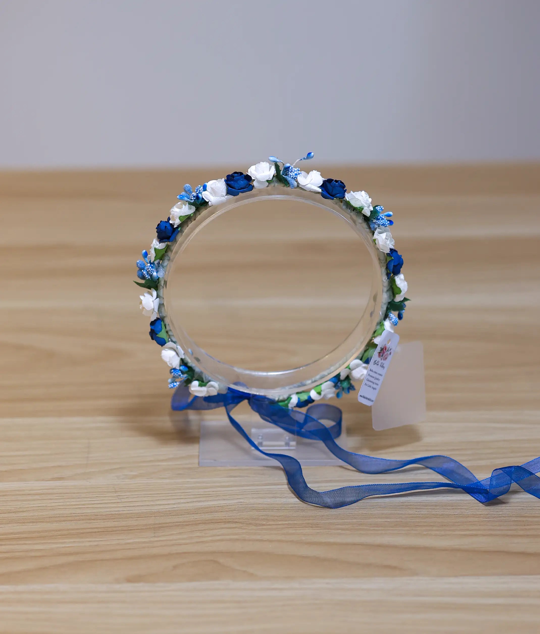 Beautiful white and blue floral baptism tiara for baby girls, featuring handcrafted fabric flowers and a soft band