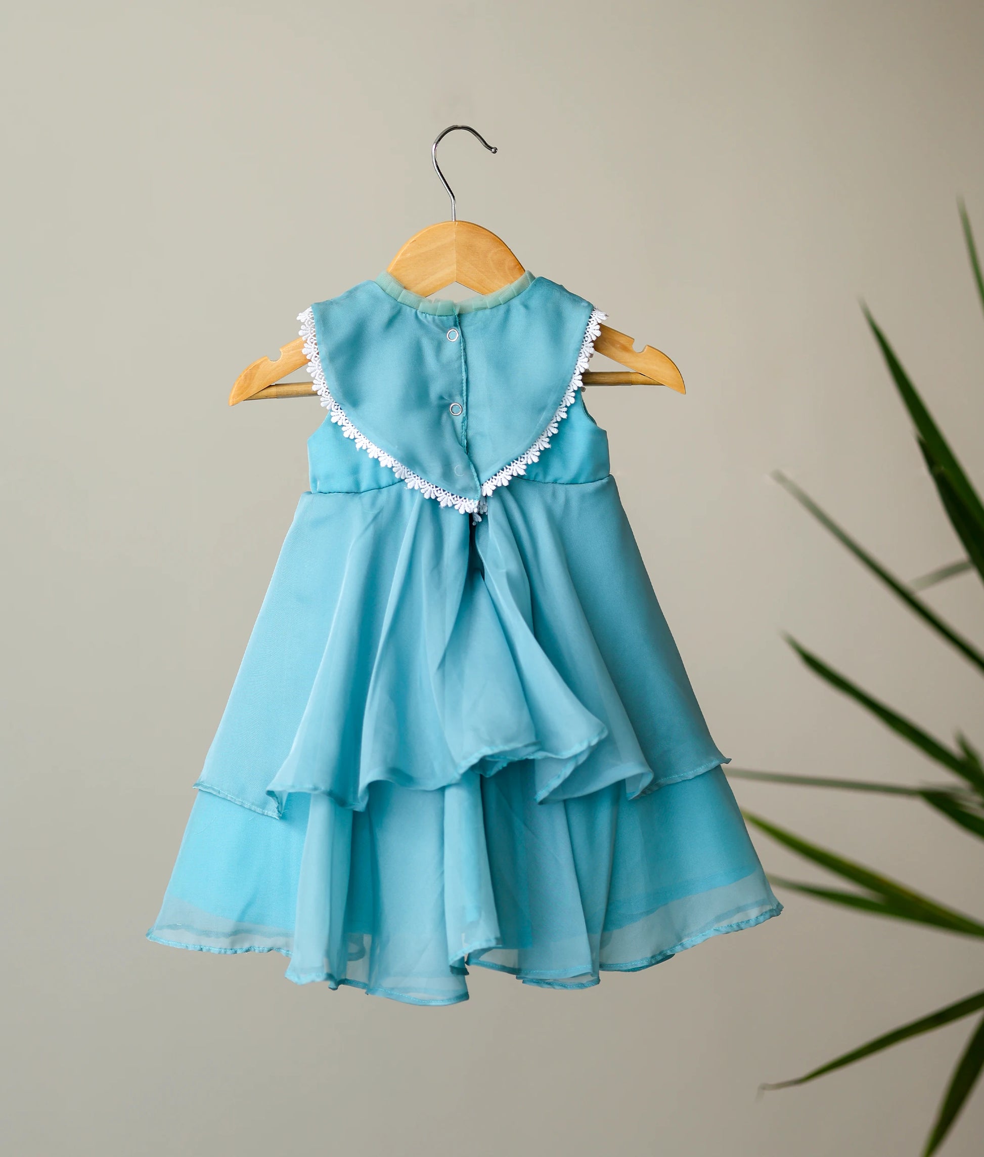 Back view of butter organza handworked birthday gown for baby girl 