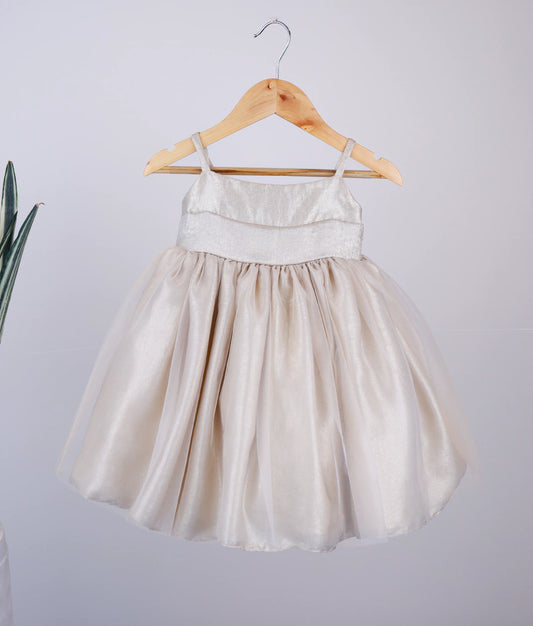 Front view of golden milan foil birthday frock for baby girl against white background