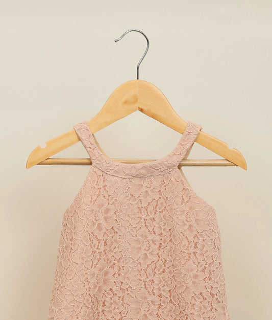 Close view of pastel peach wedding lace fabric a-line frock for baby girl 