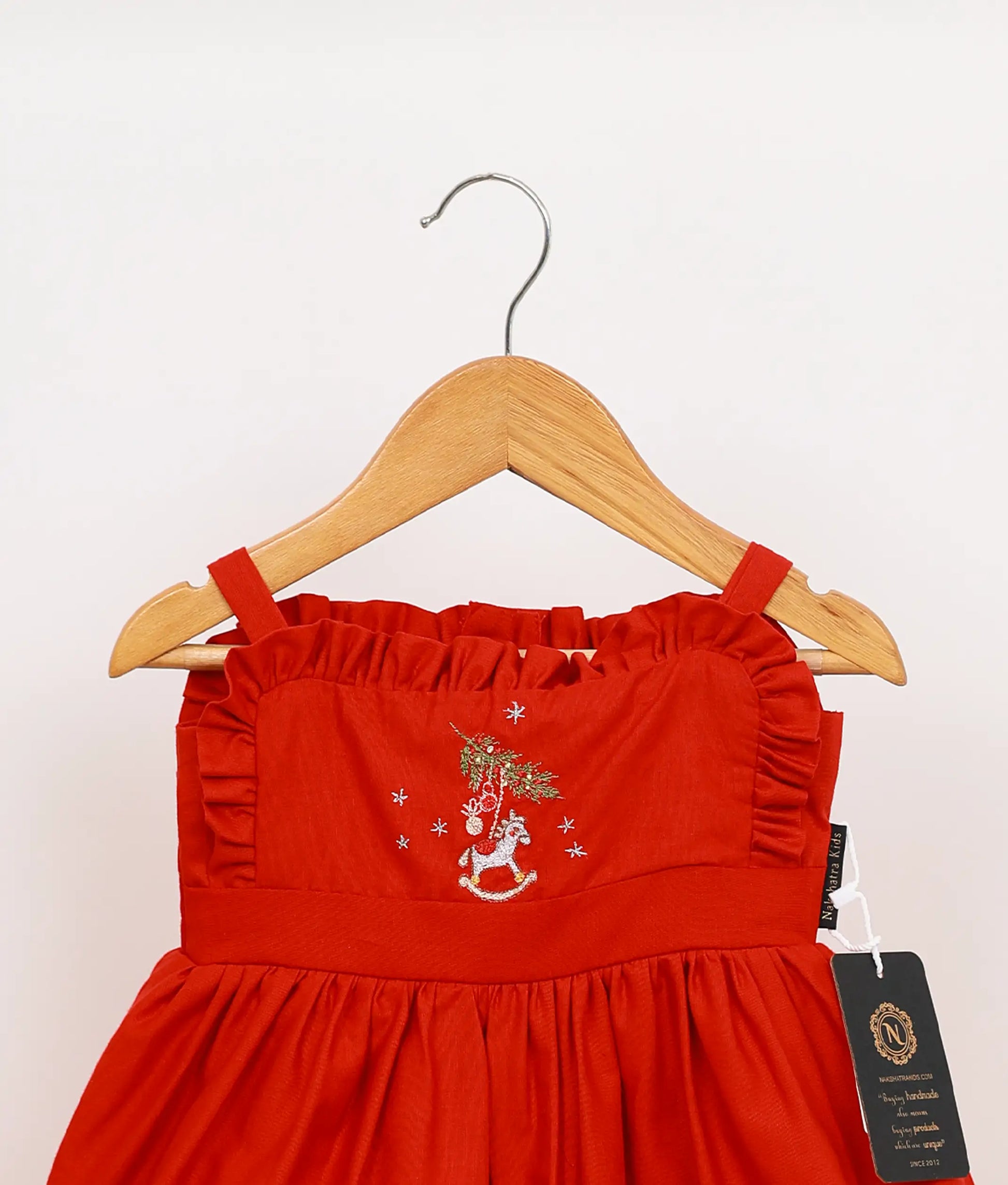 Close view of poplin embroidery Christmas frock.