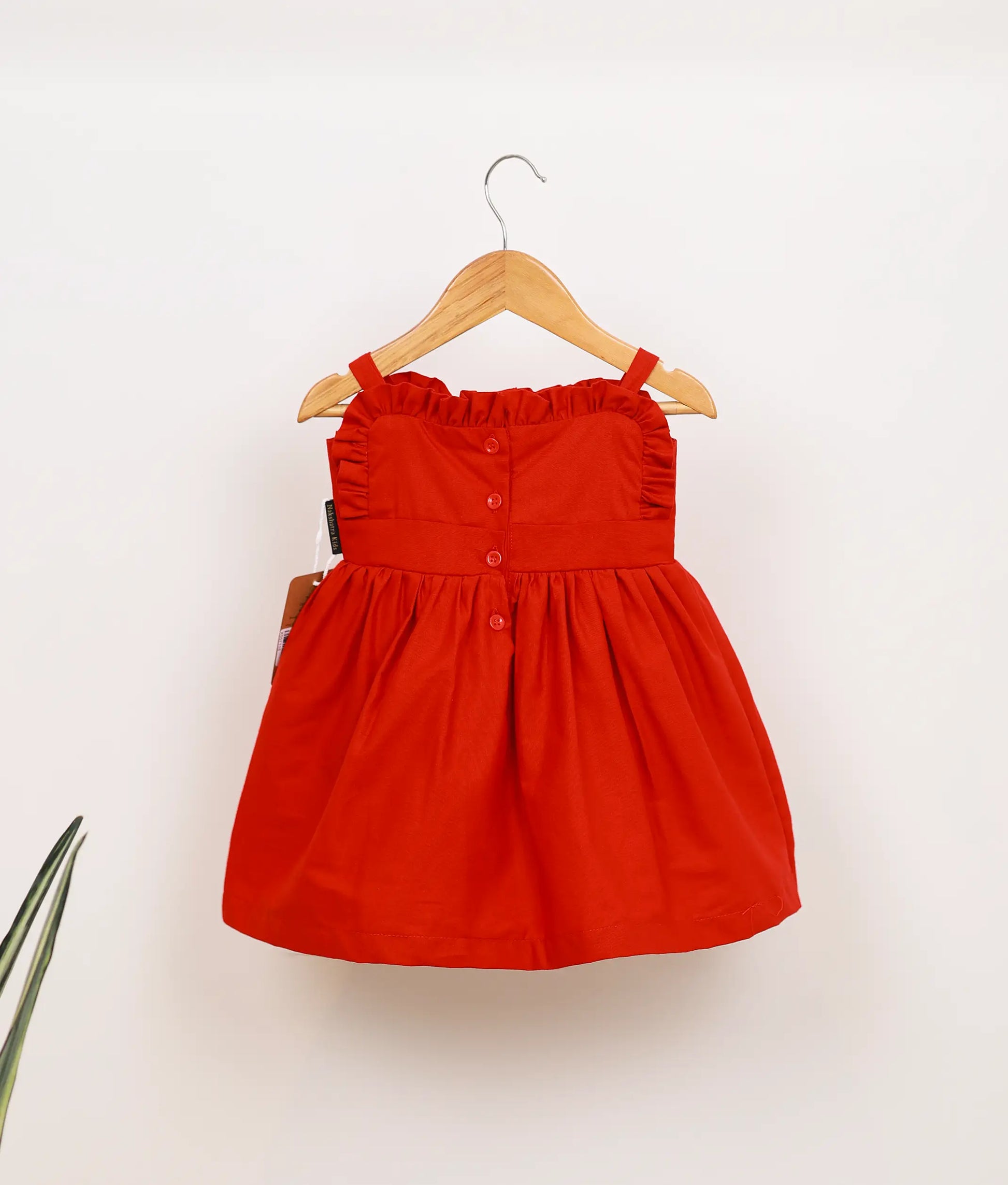 Back view of poplin embroidery Christmas frock.