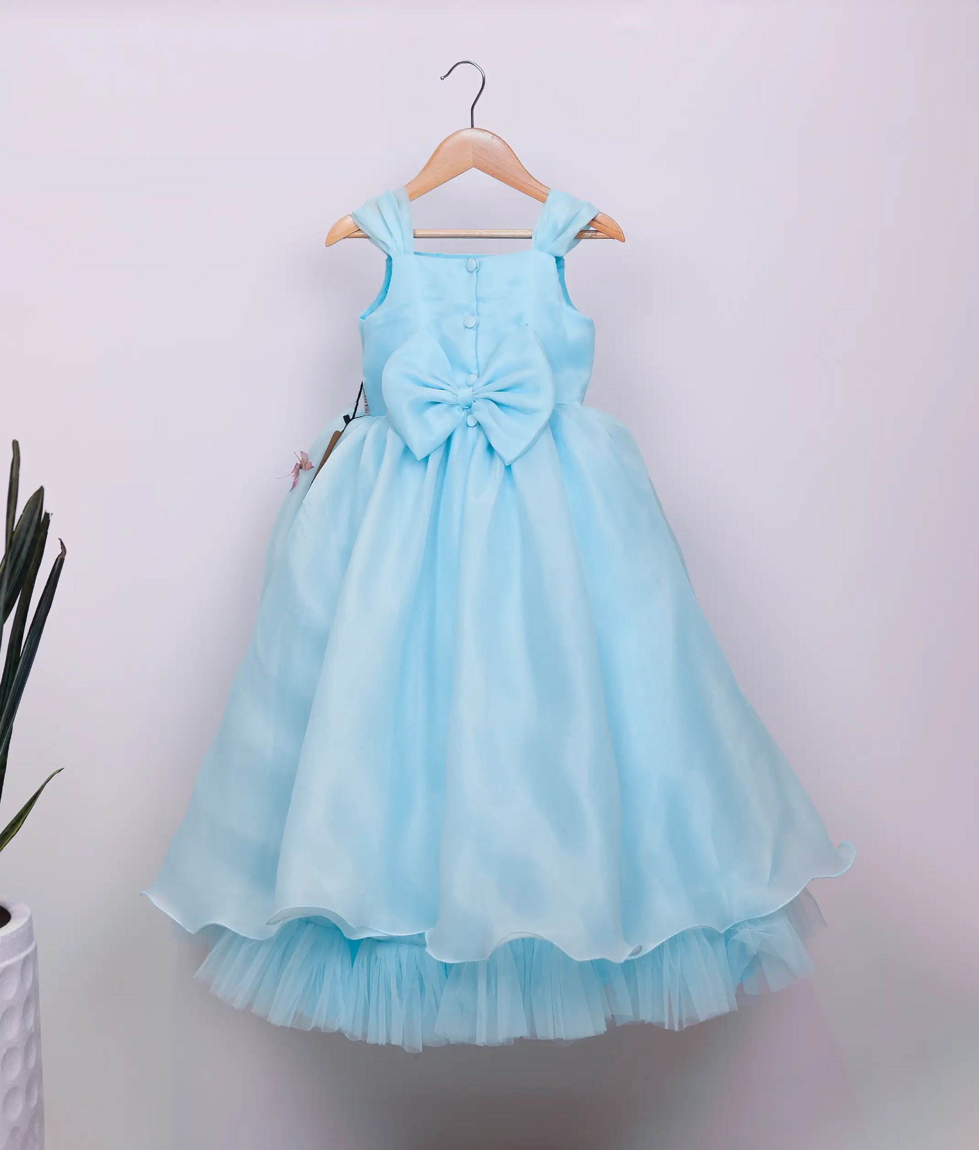 Back view of plain organza deer- and rabbit-themed birthday gown