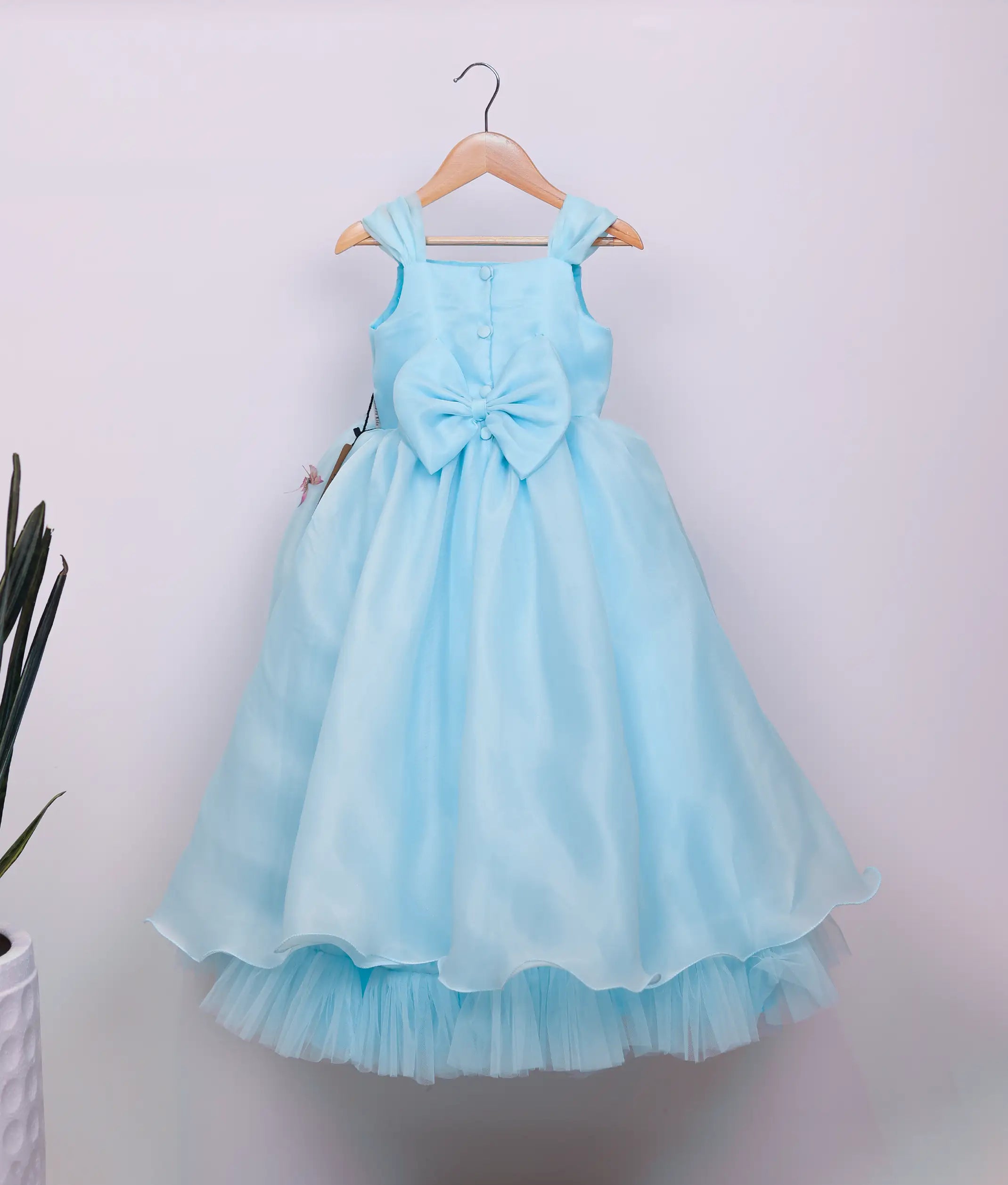 Back view of plain organza deer- and rabbit-themed birthday gown