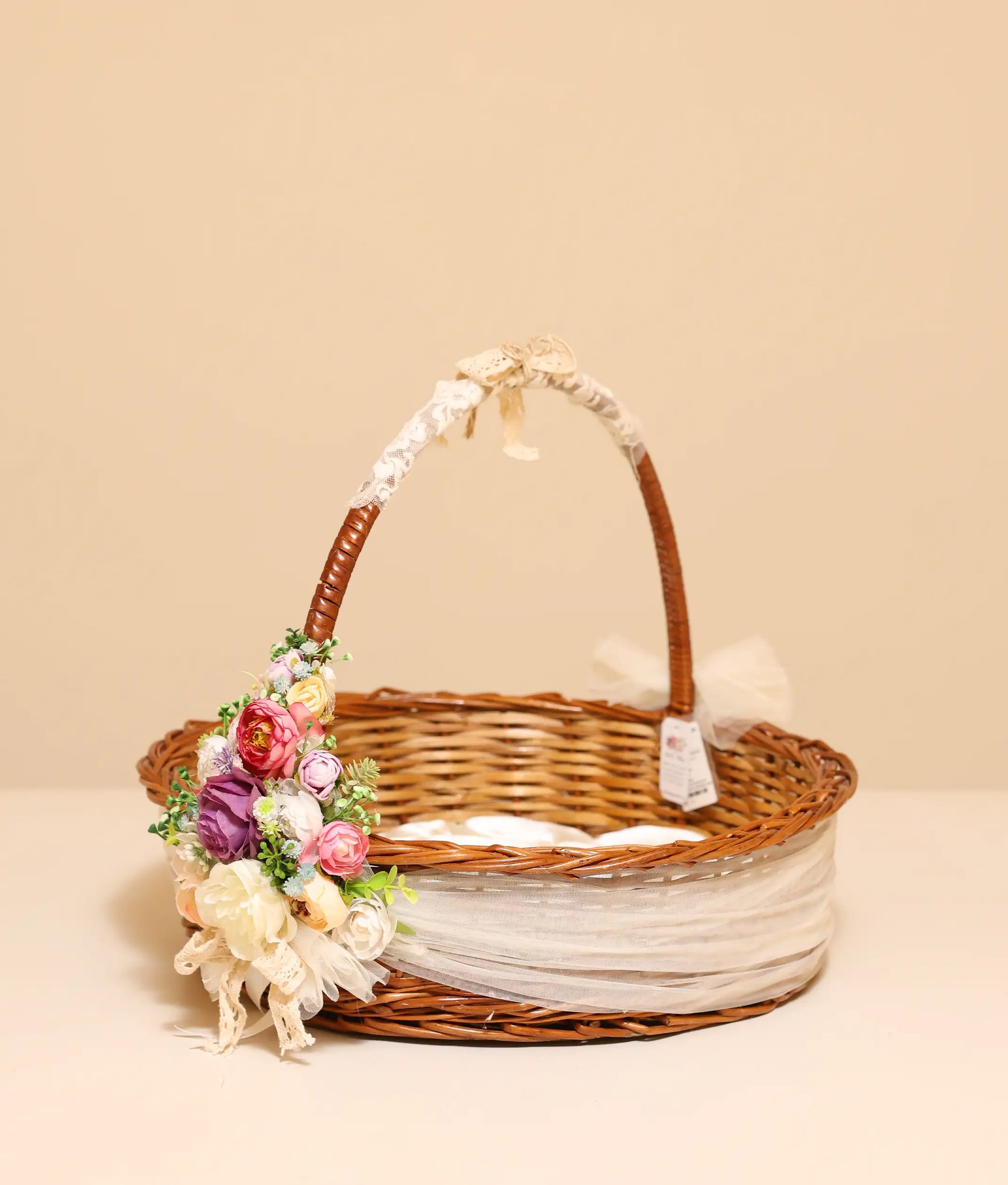 Multi-color flower Baptism Basket against plain background