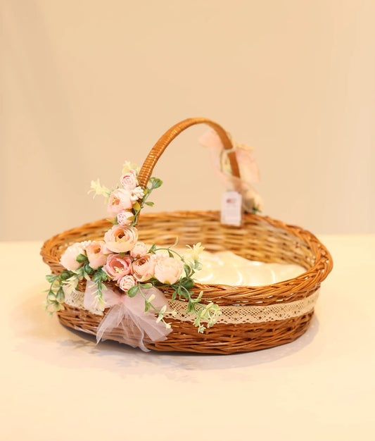 Christening wicker basket for baby christening against plain background