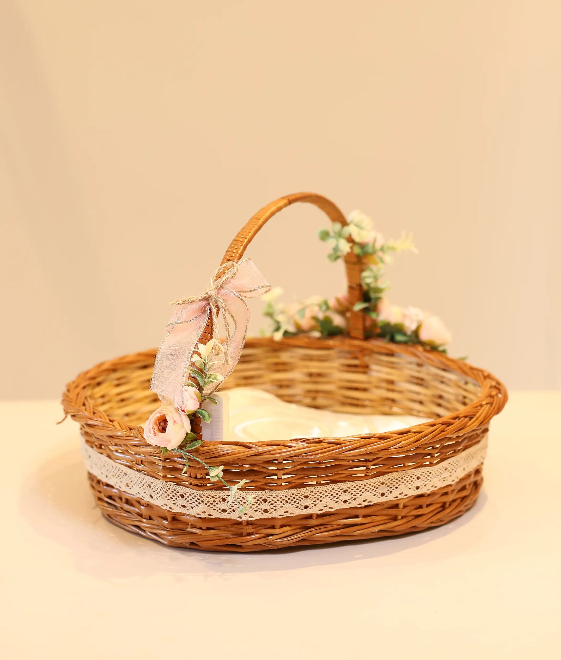 Christening wicker basket for baby christening against plain background