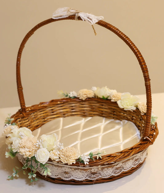 off-white decorative flower wicker baptism basket against plain background background