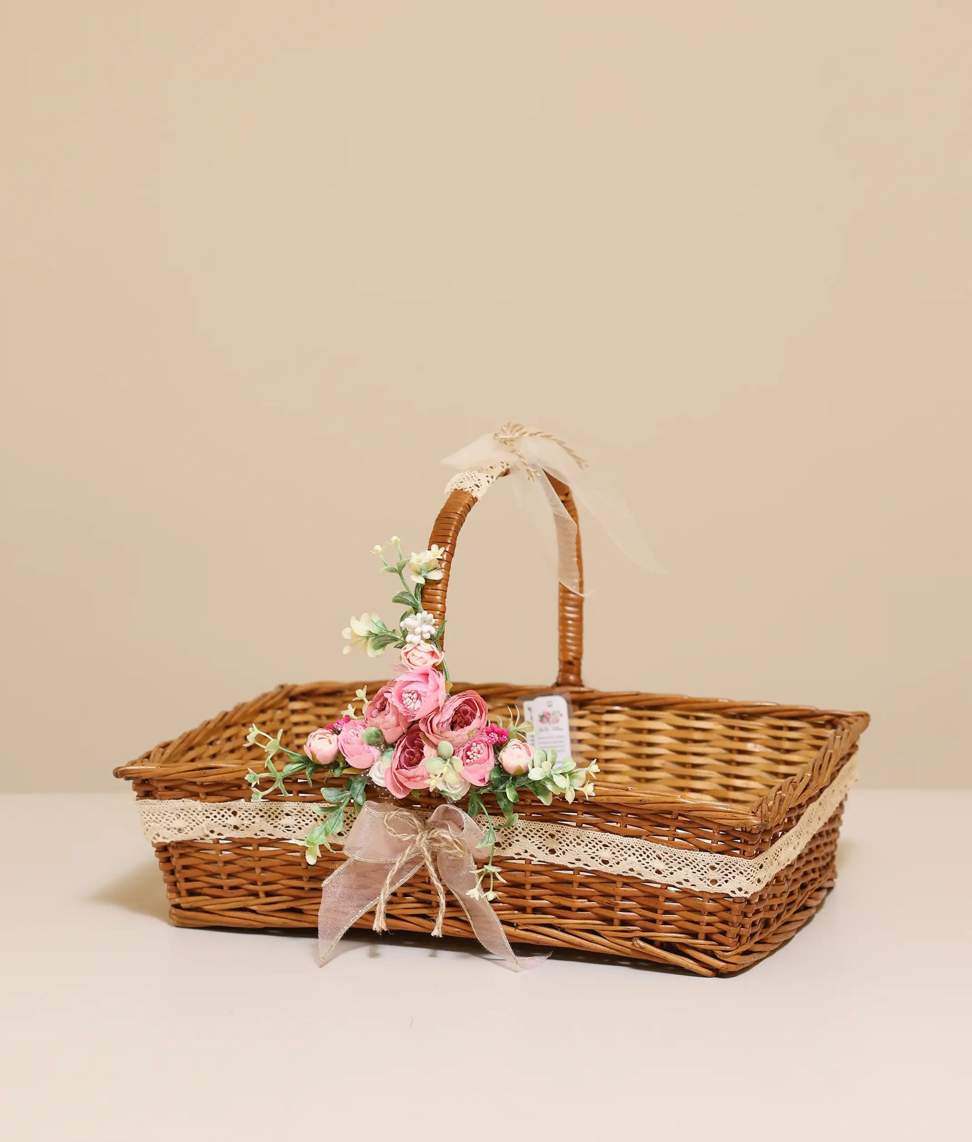 Pink flower rectangle baptism Basket For Your Baby Christening against plain background