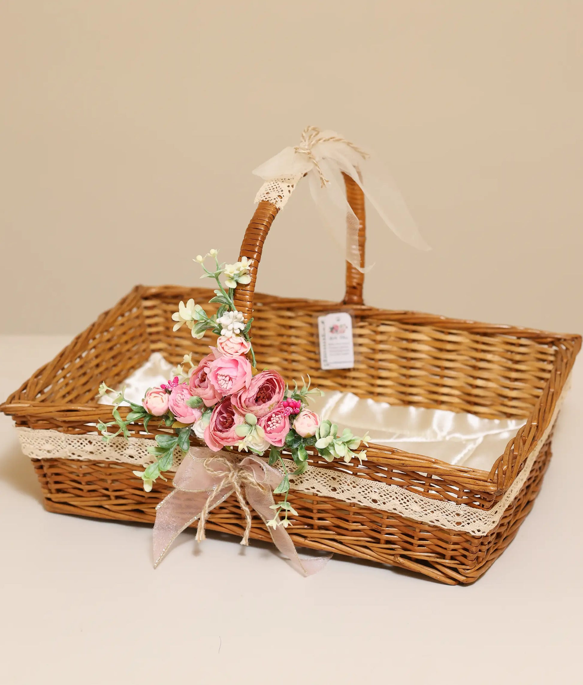 Pink flower rectangle baptism Basket For Your Baby Christening against plain background