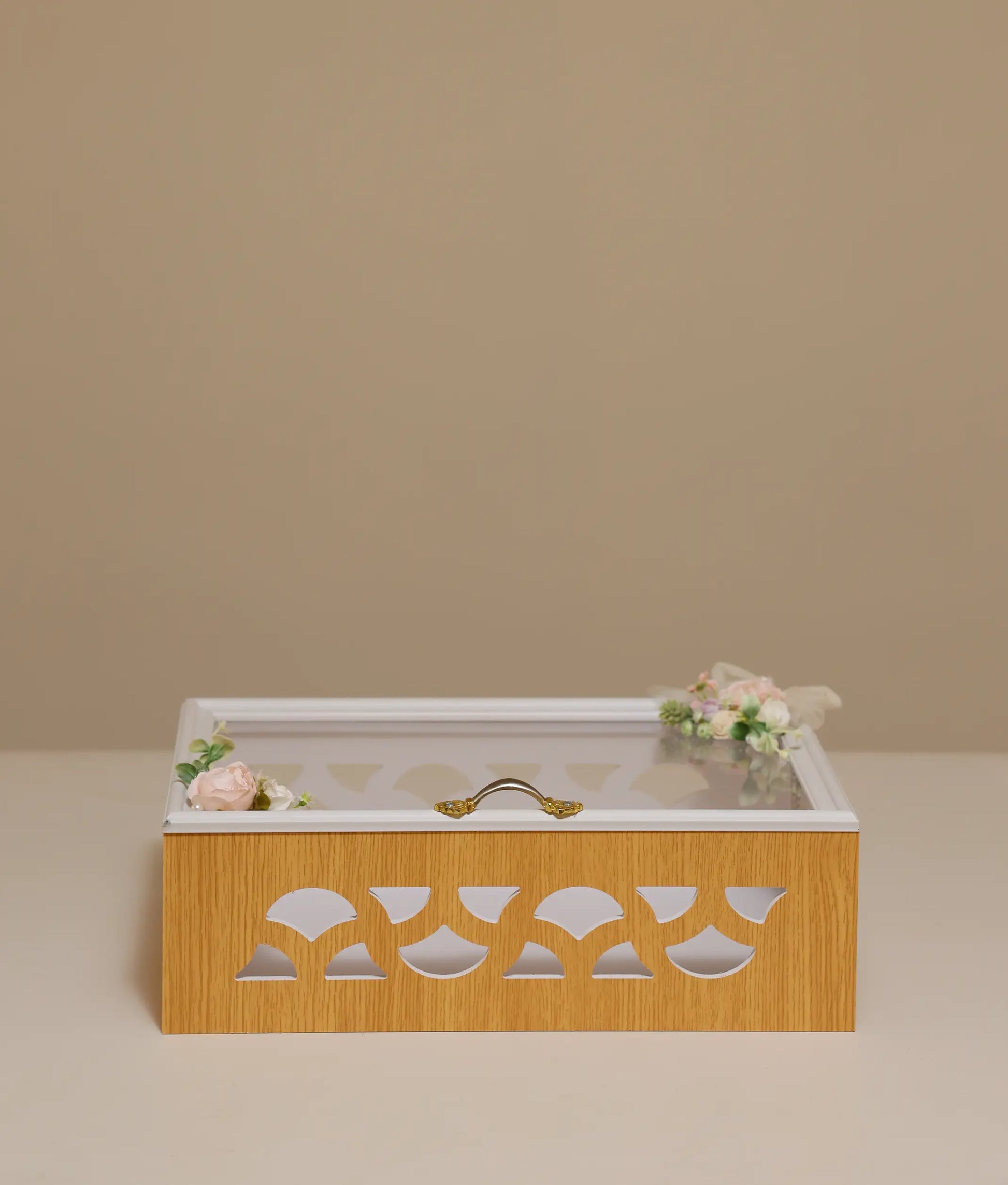 Multi-wooden decorative flower baptism box against plain background