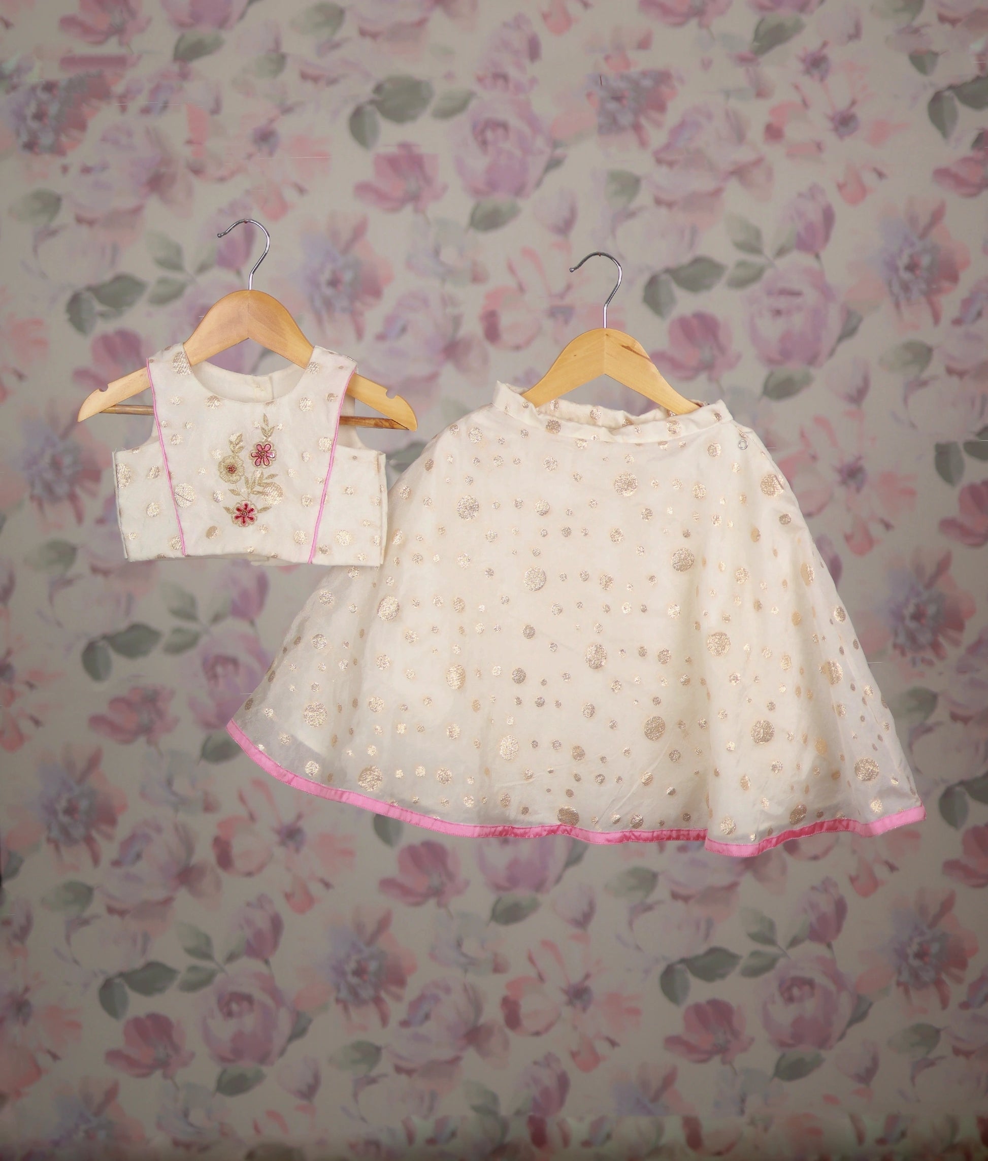 Off-white girl's lehenga choli with floral embroidery, perfect ethnic wear for kids.