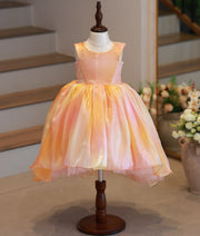 Front view of yellow and peach multi-shade laser organza high-low birthday frock for baby girls