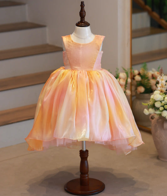 Front view of yellow and peach multi-shade laser organza high-low birthday frock for baby girls
