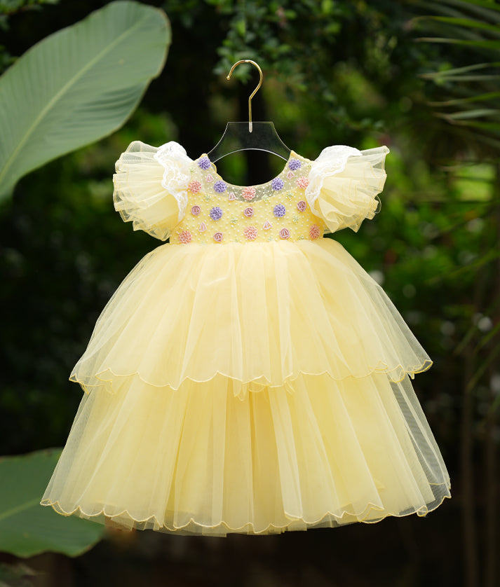 Pastel yellow organza birthday frock with floral embroidery for baby girl