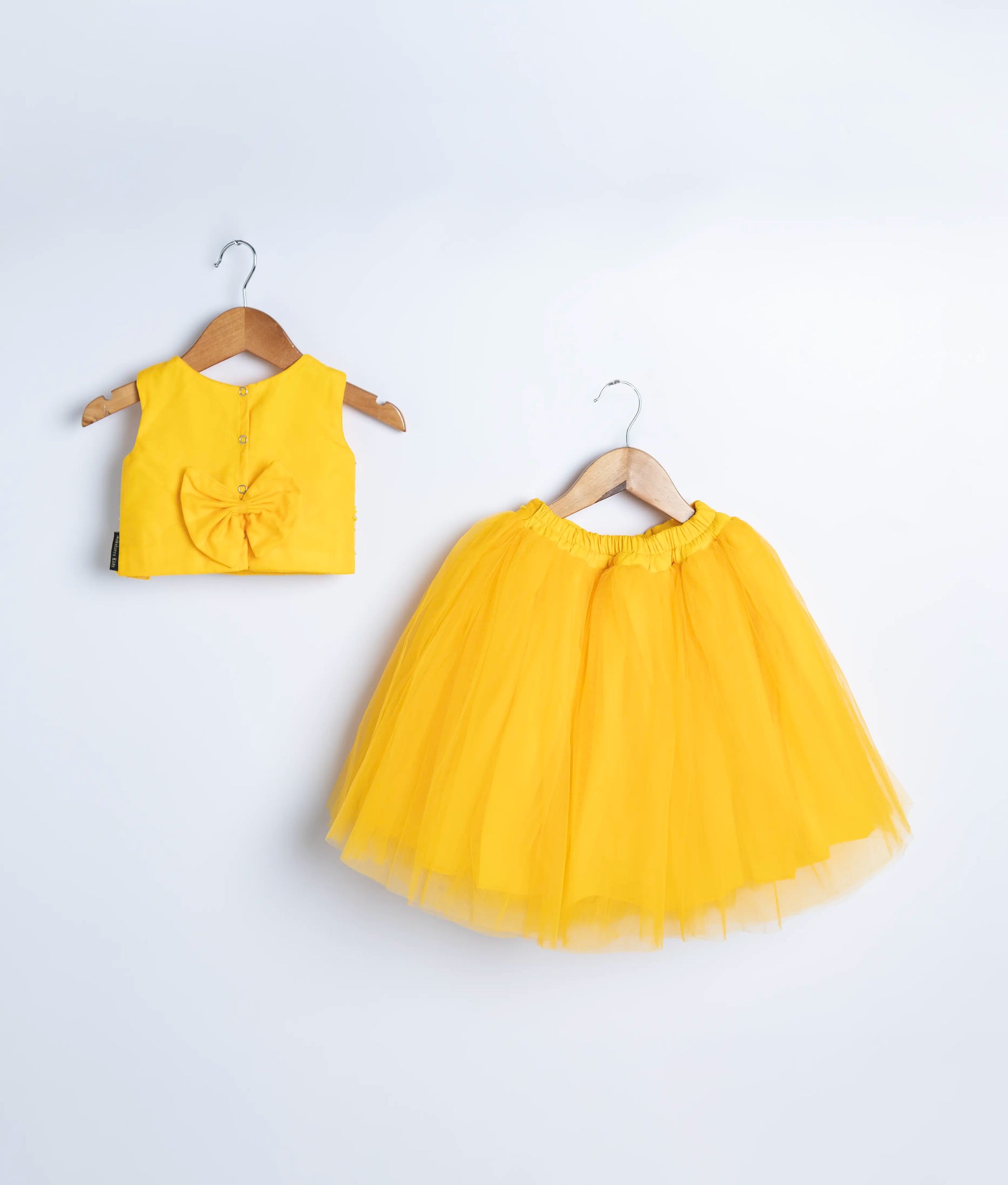Bright yellow tulle skirt component for toddler girl traditional ceremonial outfit